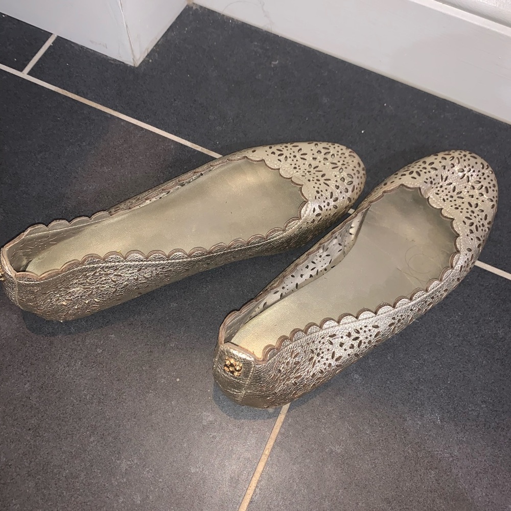 Coach Size 8 silvery gold flats.